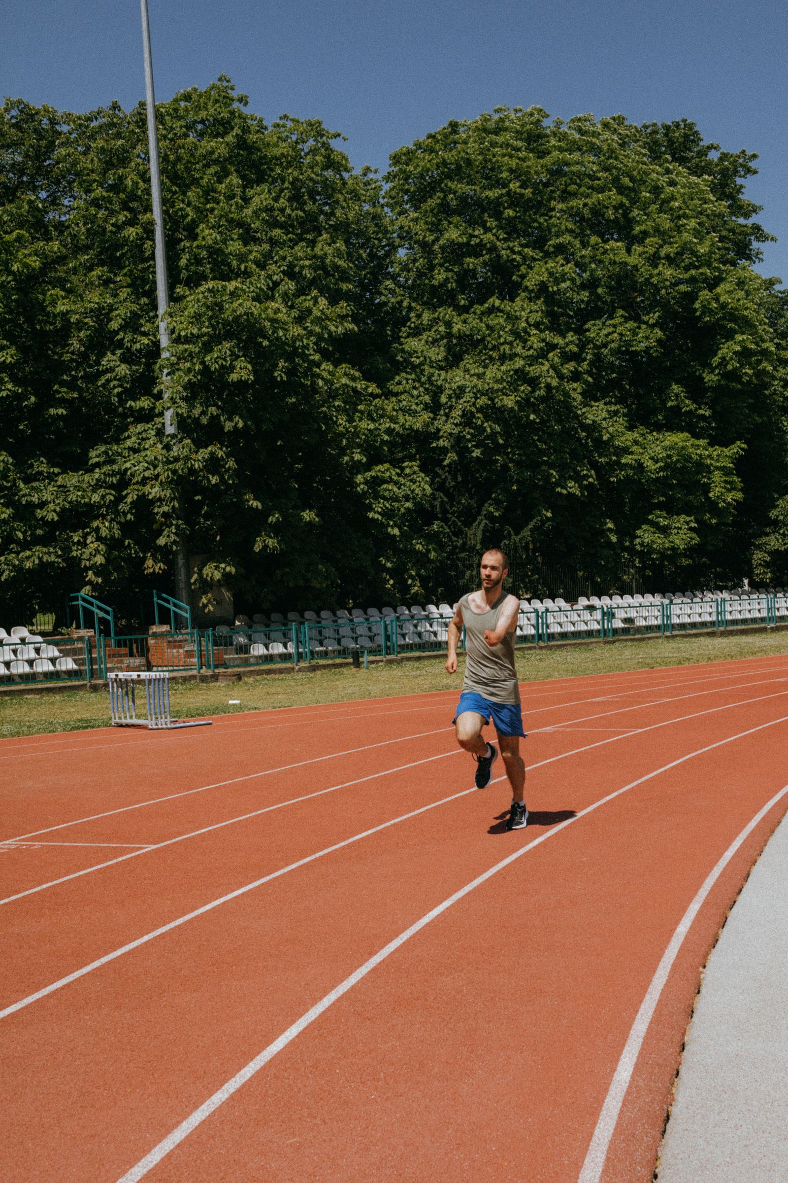 Candidate running on an athletics track during the fitness test to join Pakistan Army