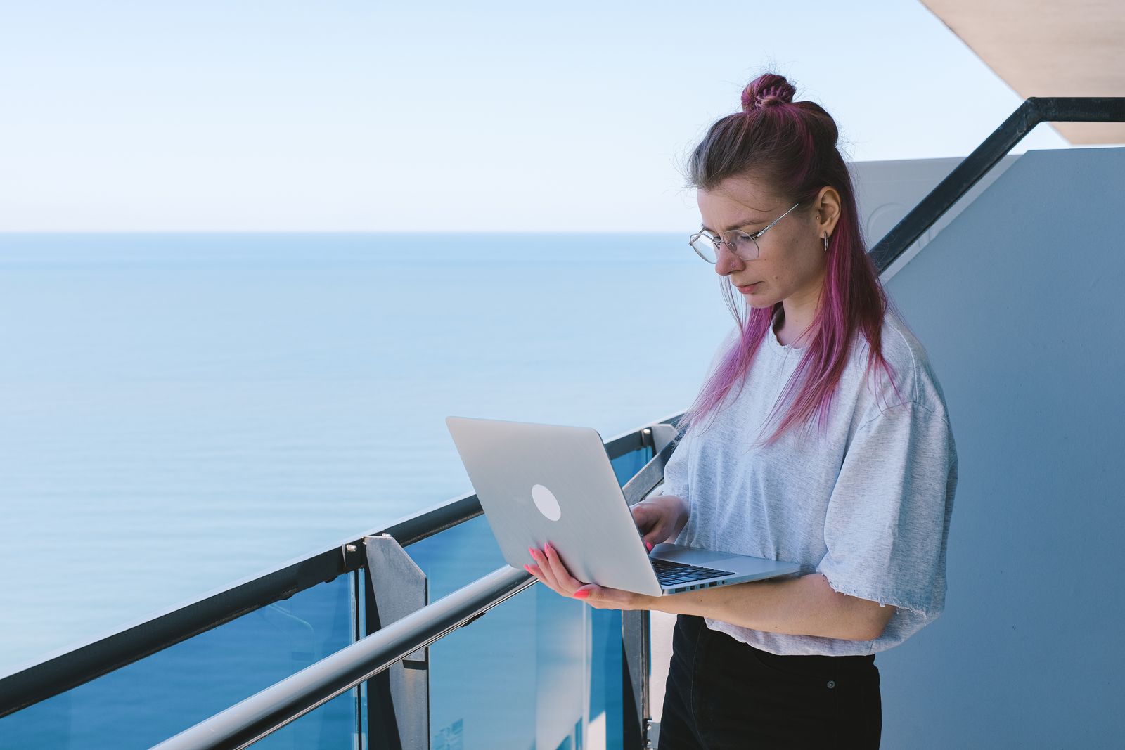 Young woman working remotely on a laptop